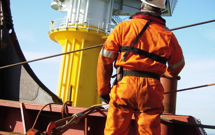 Man stood looking at offshore asset
